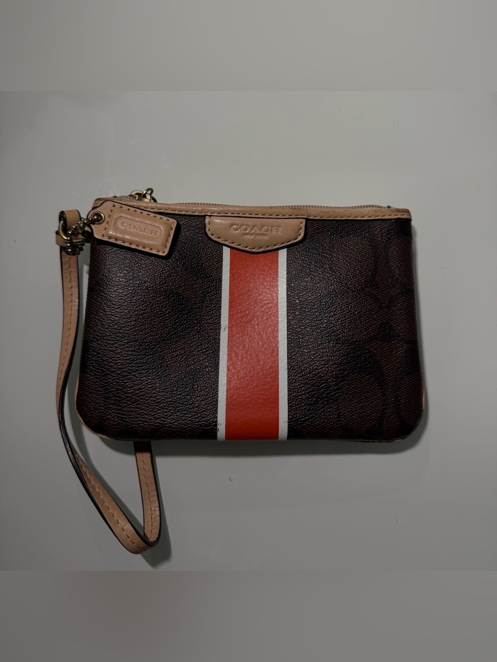 Coach signature PVC Wristlet| Brown Monogram with Stripe| Great Condition